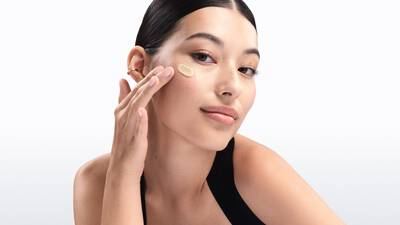 Woman with hydrated skin, demonstrating the benefits of skincare for dry and sensitive skin