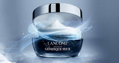 Woman applying a prebiotic and probiotic-enriched skincare product from Lancome