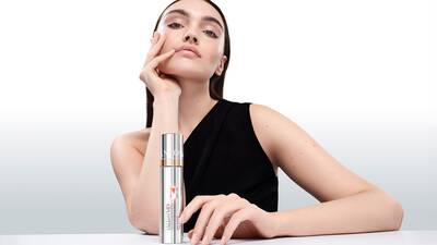 Woman with hydrated skin, demonstrating the benefits of skincare for dry and sensitive skin