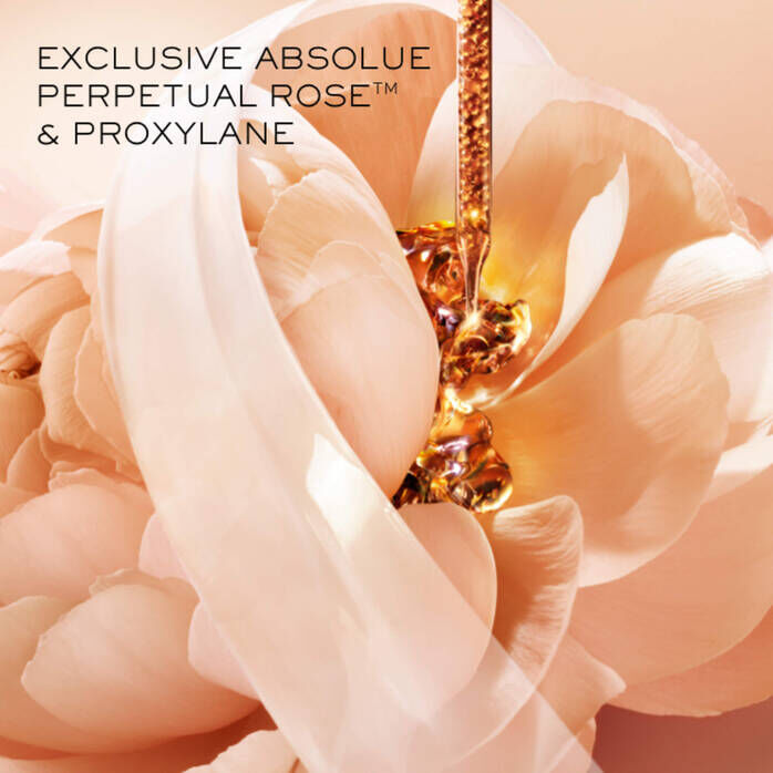 Exclusive Absolue Perpetual Rose and Pro-Xylane being infused into a pink rose background for Lancome skincare.