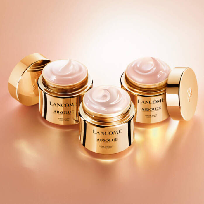 Lancome Absolue cream showcasing its rich, velvety pink texture