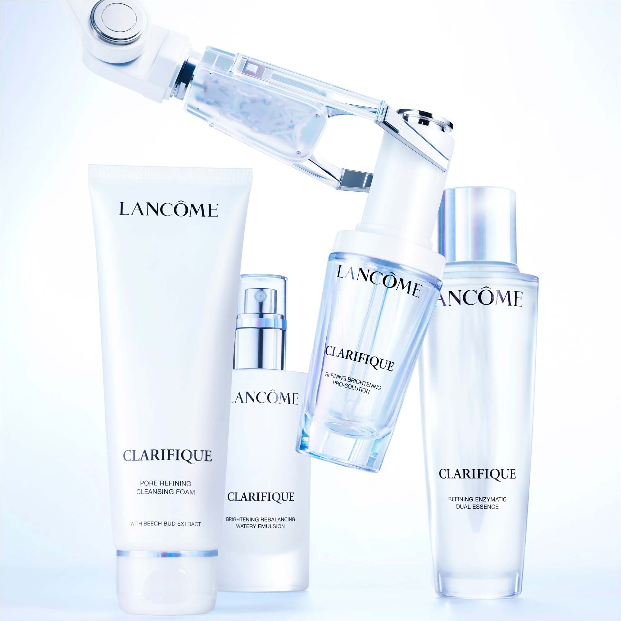 Lancome Clarifique skincare range,  including cleansing foam, serum, dual essence, and watery emulsion.