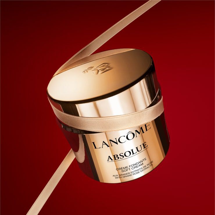 Lancome Absolue Soft Cream on vibrant red background
