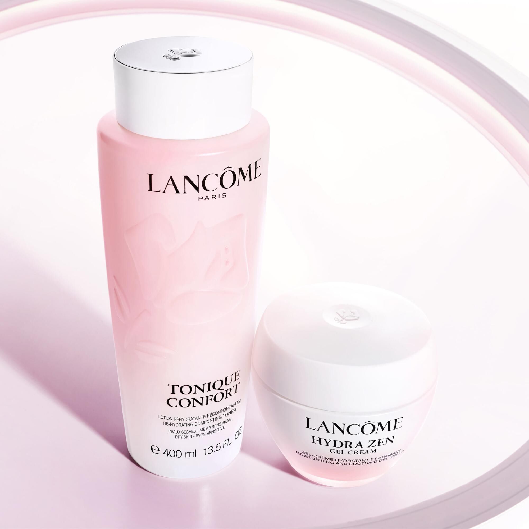 Lancome Tonique Confort toner with Advanced Genifique Youth Activating Serum  illustrating a skincare routine for hydration and youth activation.