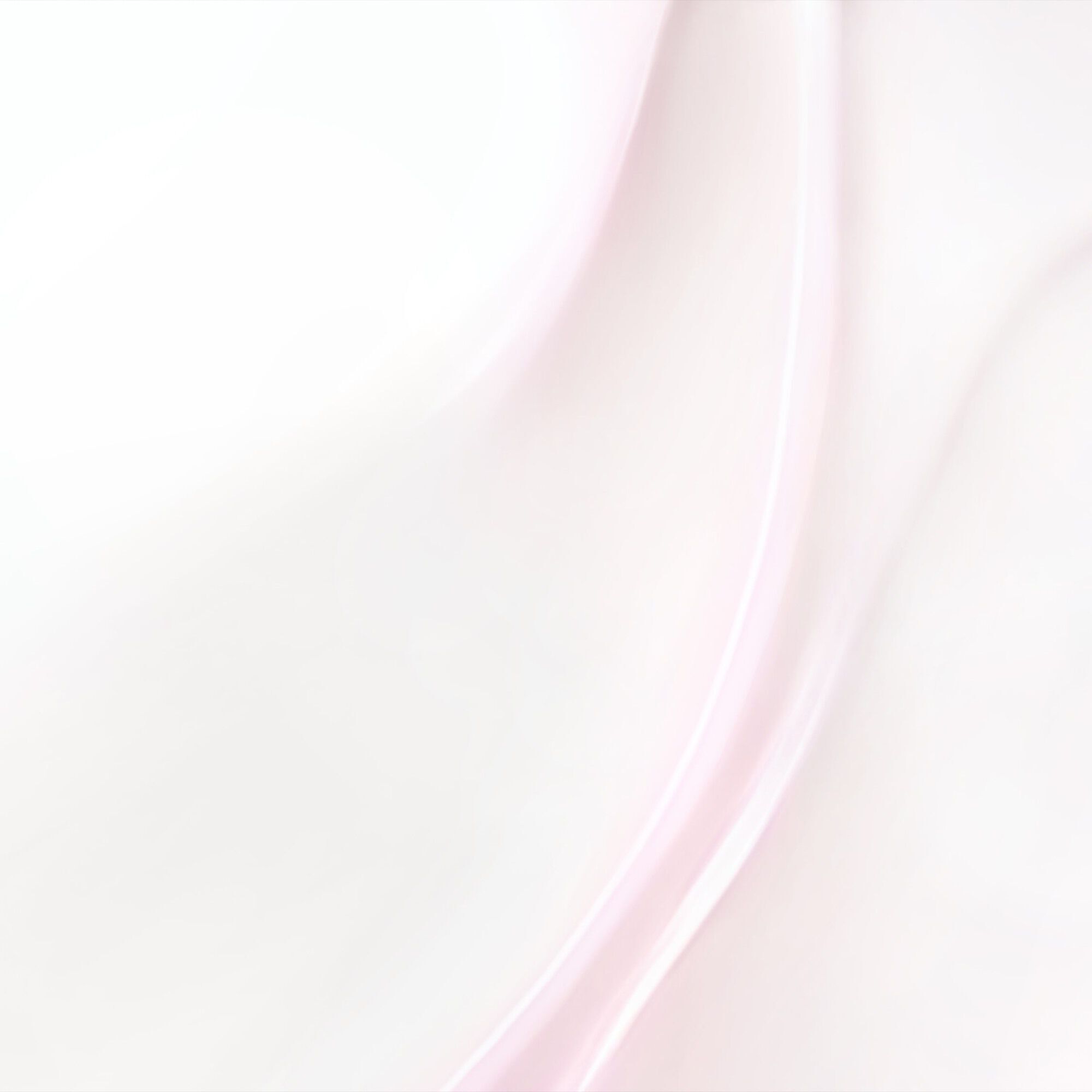 Close-up of the smooth, pink milky texture of Lancome Tonique Confort toner