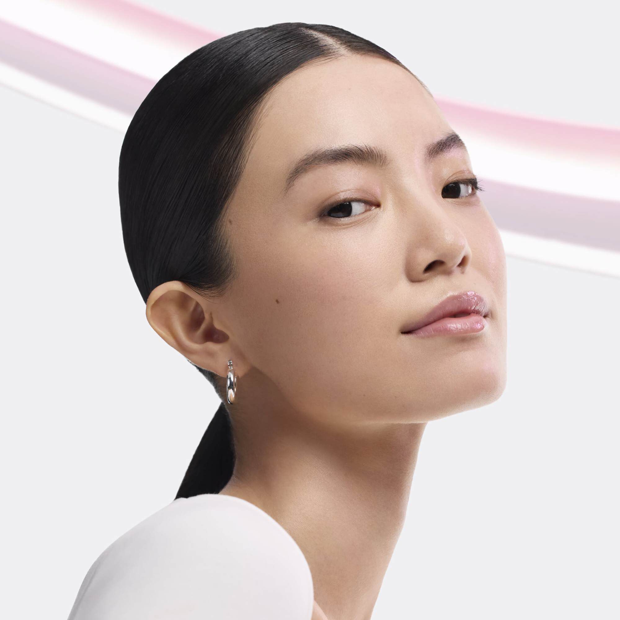 Key ingredients in Lancome Tonique Confort, including acacia honey, natural-origin hyaluronic acid, rose water, and sweet almond